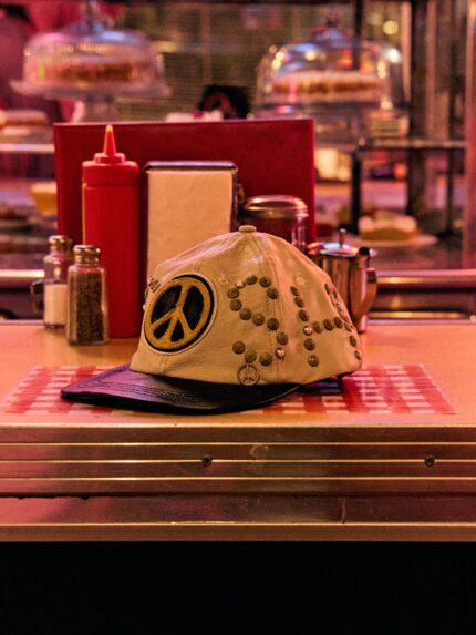 SATOSHI NAKAMOTO STUDDED WRAP AROUND LEATHER CAP